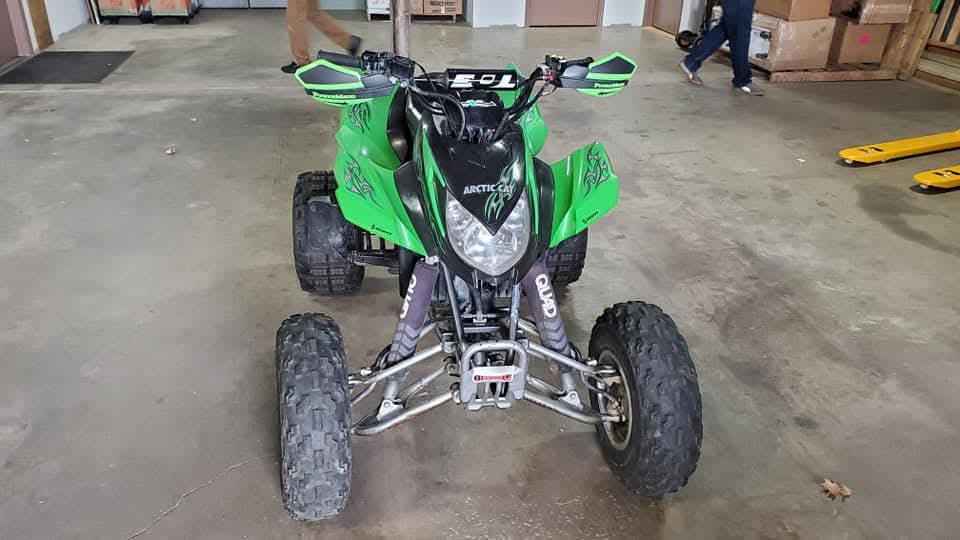 All-terrain vehicle awaiting international shipment at a warehouse
