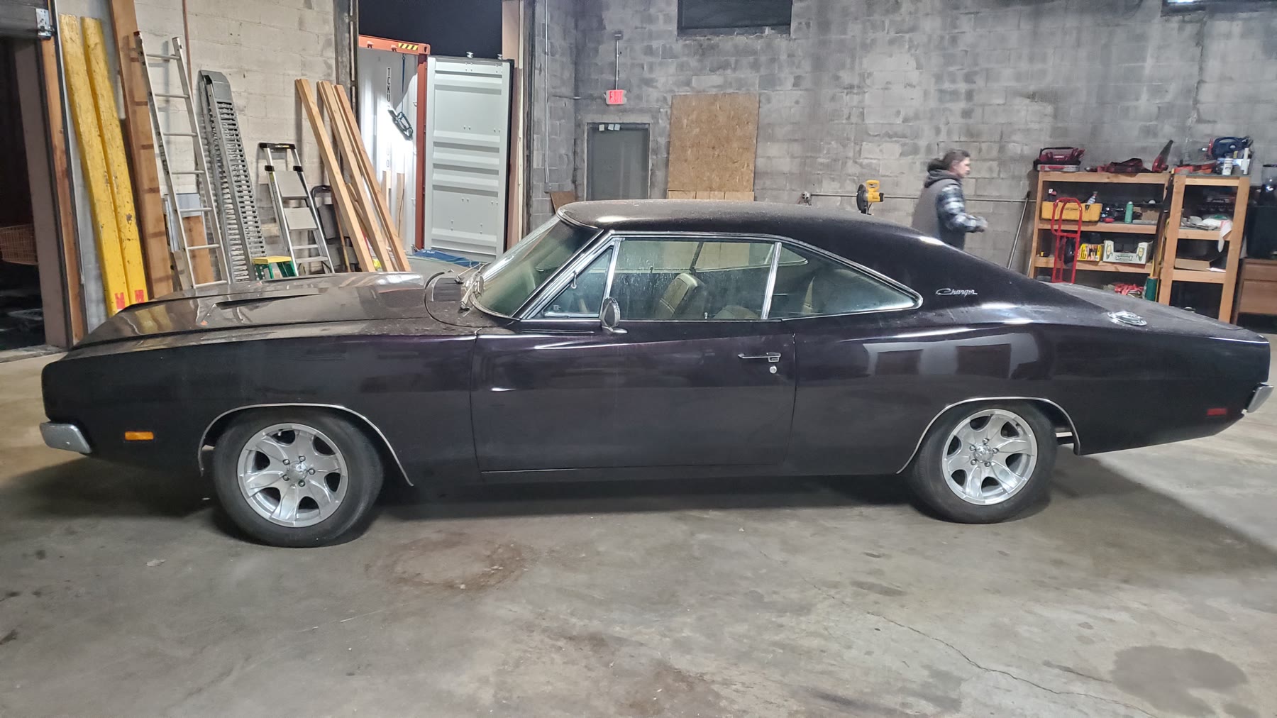 Black Dodge Charger photographed during warehouse intake