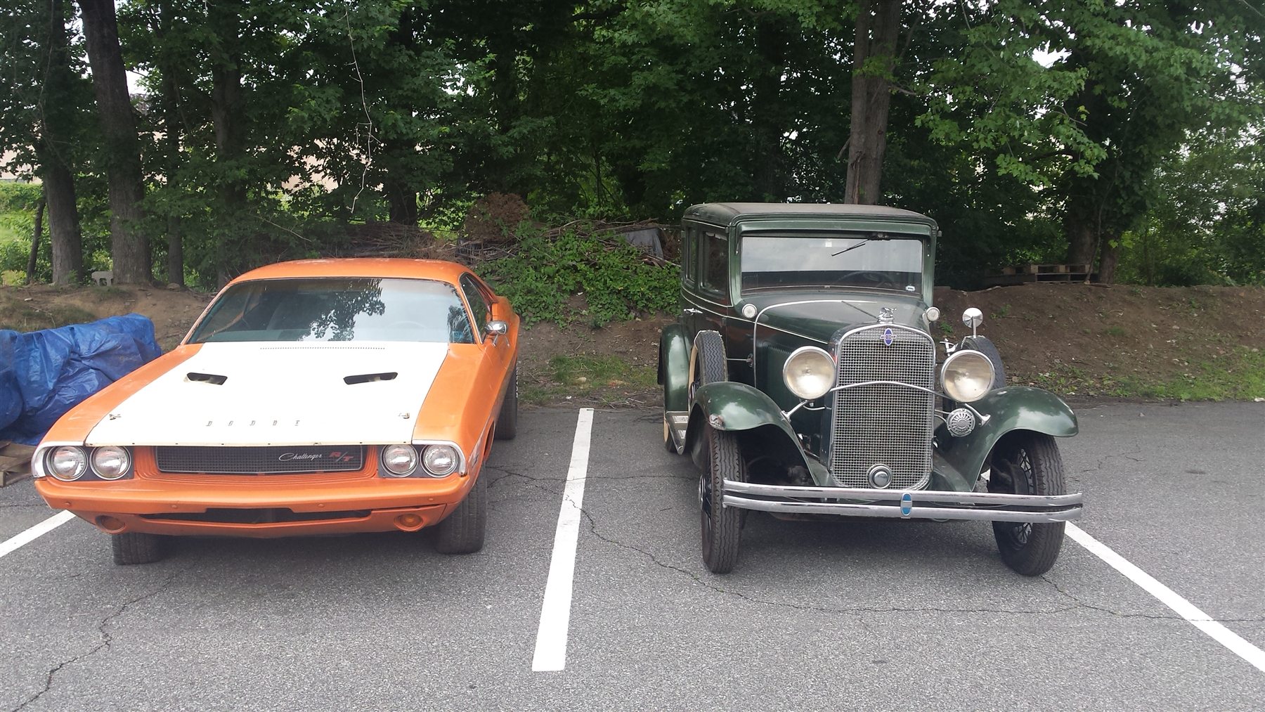 Two classic vehicles awaiting international transport