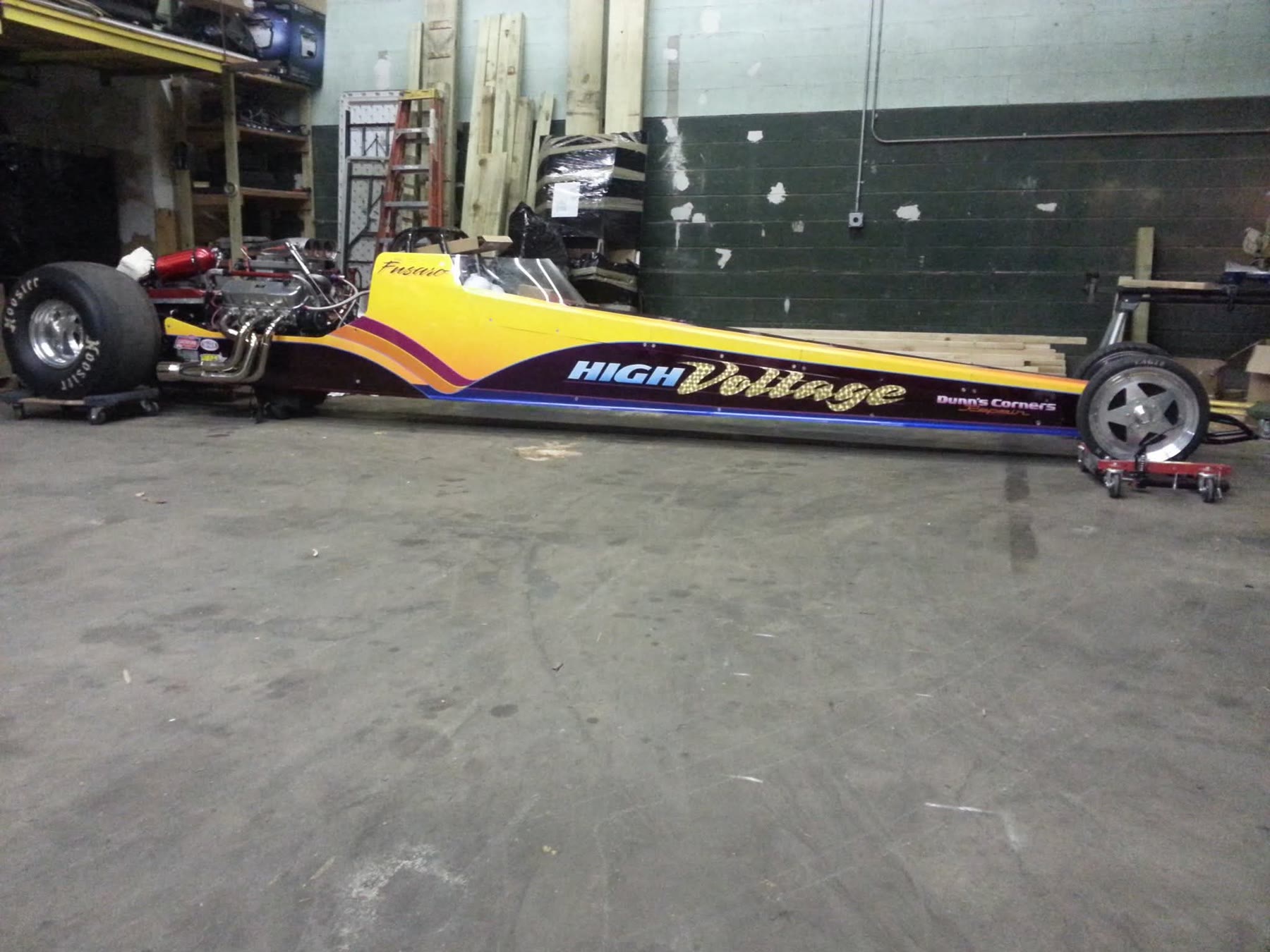 Specialty vehicle staged in a warehouse before transport
