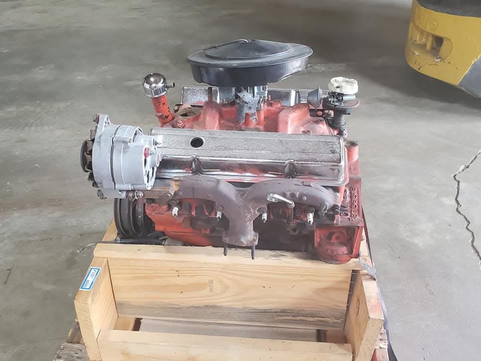 Automotive part secured to a wooden pallet before shipping