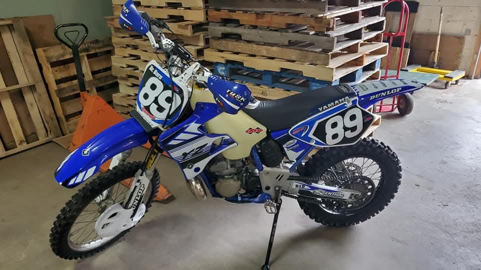 Blue Yamaha motocross bike staged in the warehouse before international shipping